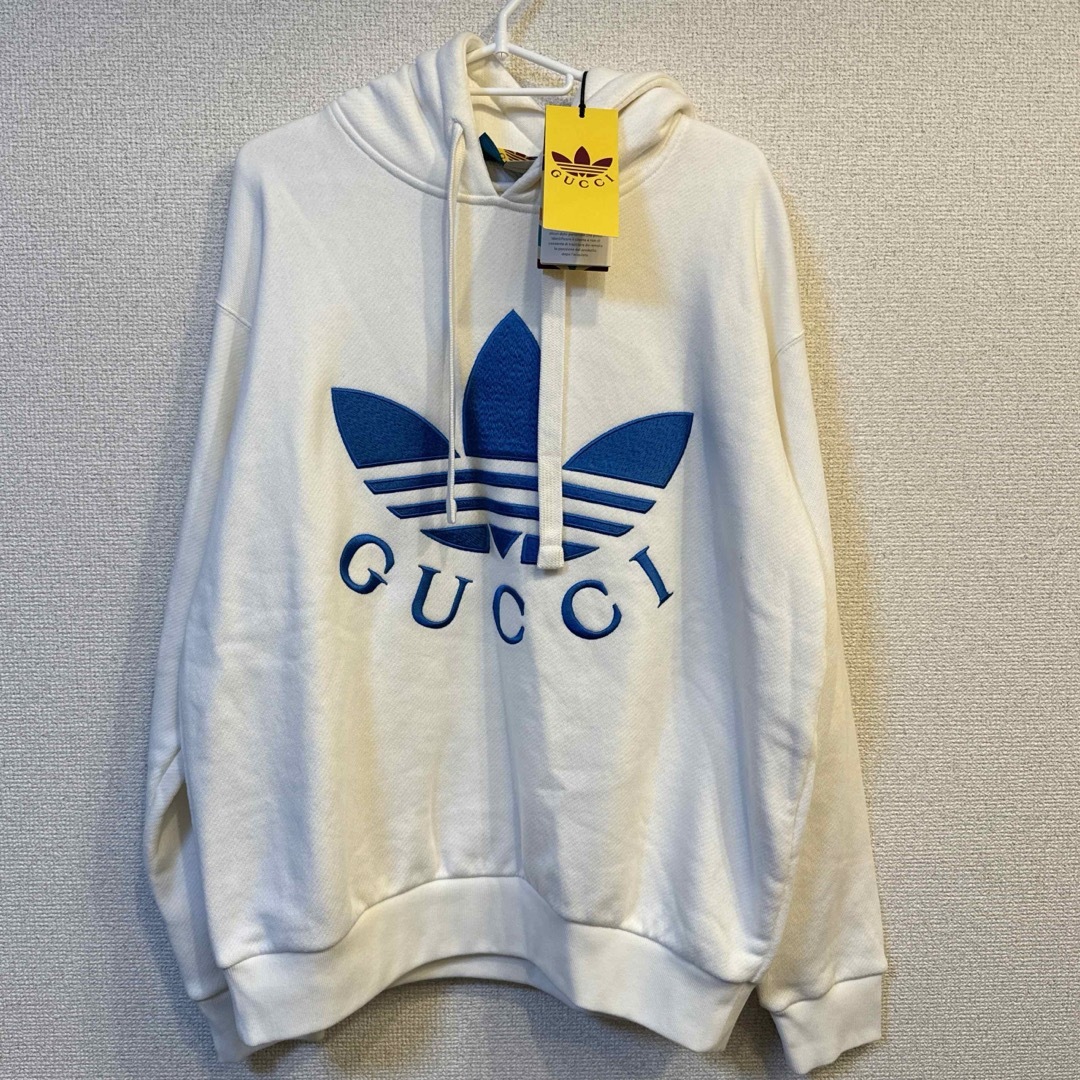 Gucci(グッチ)の新品　GUCCI×adidasコラボ　パーカー　グッチ　XSサイズ メンズのトップス(パーカー)の商品写真