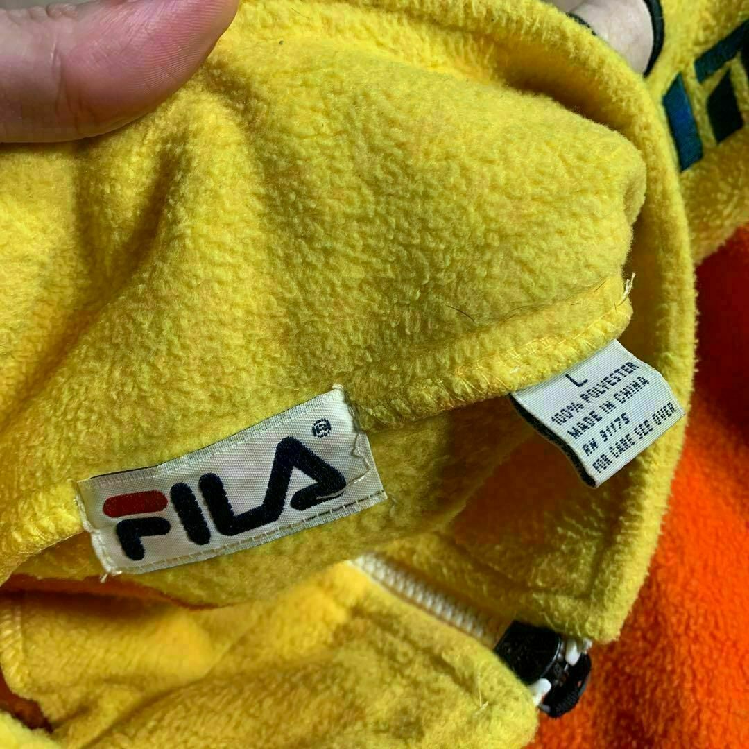 FILA(フィラ)の激レア FILA フィラ オレンジ ハーフジップフリース サイド刺繍 メンズのジャケット/アウター(ブルゾン)の商品写真