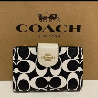 COACH コーチ 三つ折り財布 ダークブラウン 馬車柄 ロゴの通販｜ラクマ