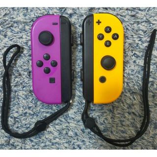 ニンテンドースイッチ(Nintendo Switch)のジョイコン　ネオンパープル　ネオンオレンジ(携帯用ゲーム機本体)