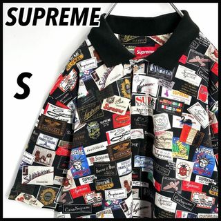 シュプリーム(Supreme)の【入手困難】シュプリーム☆ラベルロゴ　総柄 ポロシャツ　S　ブラック　人気モデル(ポロシャツ)