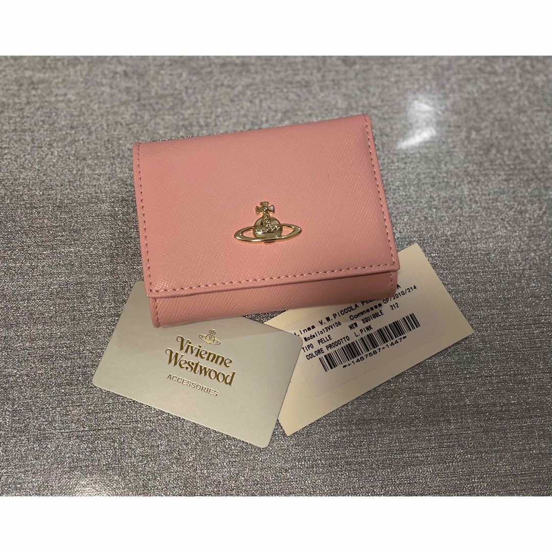 Vivienne Westwood(ヴィヴィアンウエストウッド)の未使用　Vivienne Westwood  折り財布　ミニ財布　ライトピンク レディースのファッション小物(財布)の商品写真