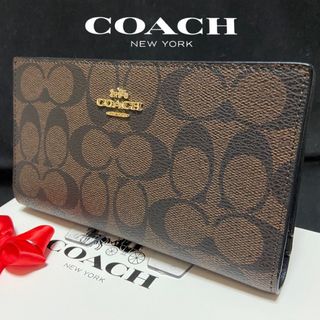 コーチ(COACH)の贈り物にも☆コーチ おしゃれ手帳型　大容量　長財布　ブラウン　メンズレディス(長財布)