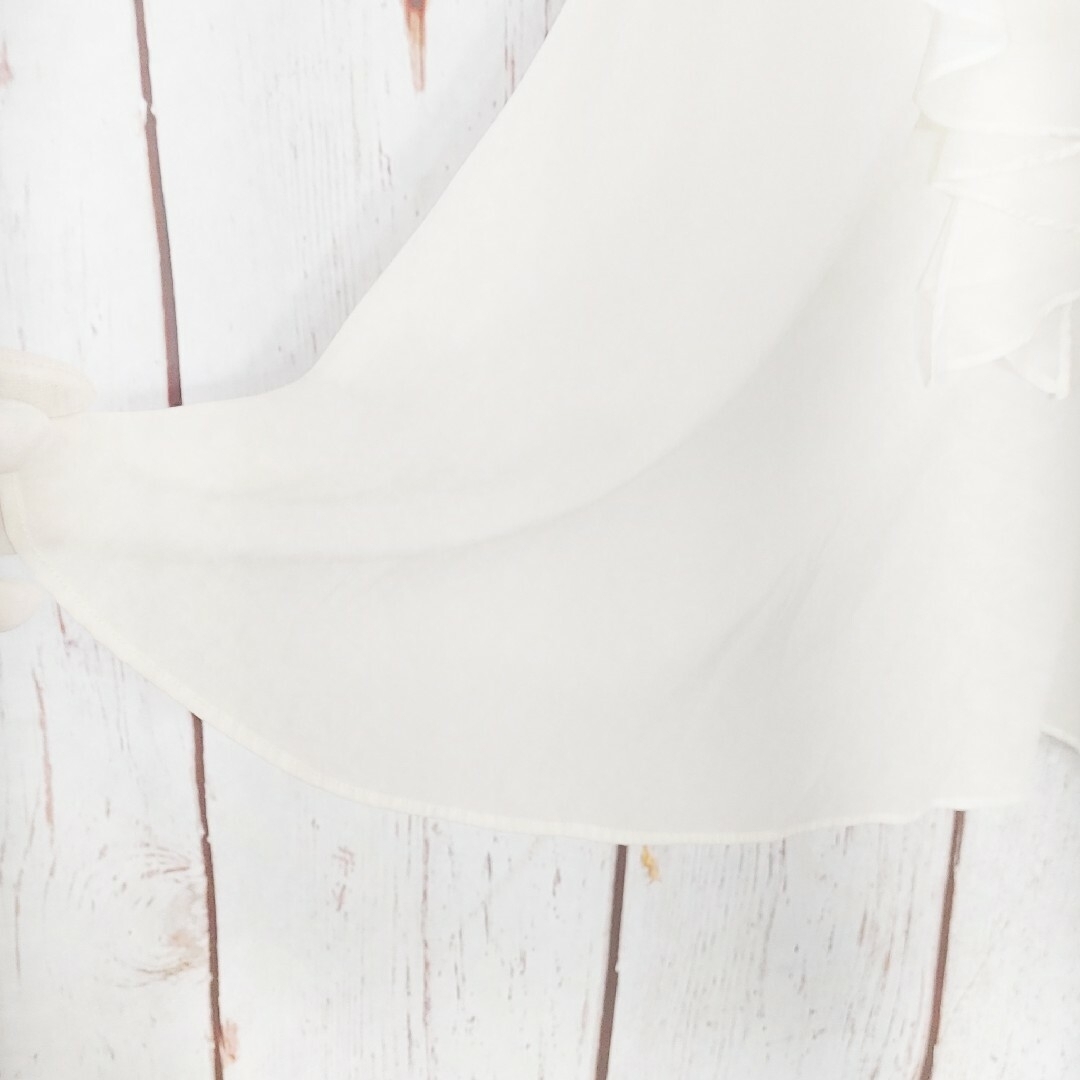 SPIRAL GIRL(スパイラルガール)のスパイラルガール カットソー  オフホワイト 透け感 クロスバック フリル レディースのトップス(カットソー(半袖/袖なし))の商品写真