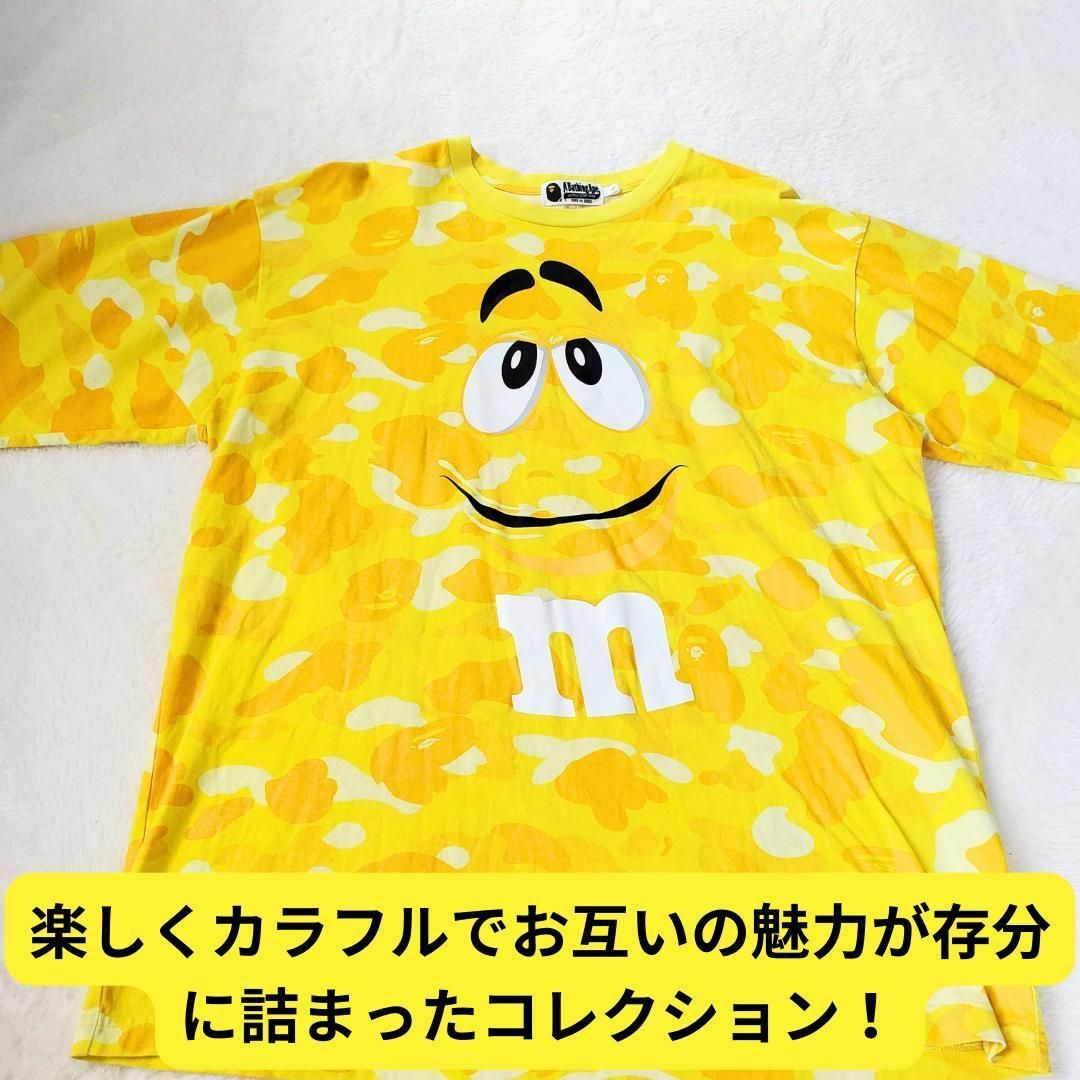 A BATHING APE(アベイシングエイプ)の限定コラボ　A BATHING APE × M&M’S 　Tシャツ　カットソー黄 メンズのトップス(Tシャツ/カットソー(半袖/袖なし))の商品写真