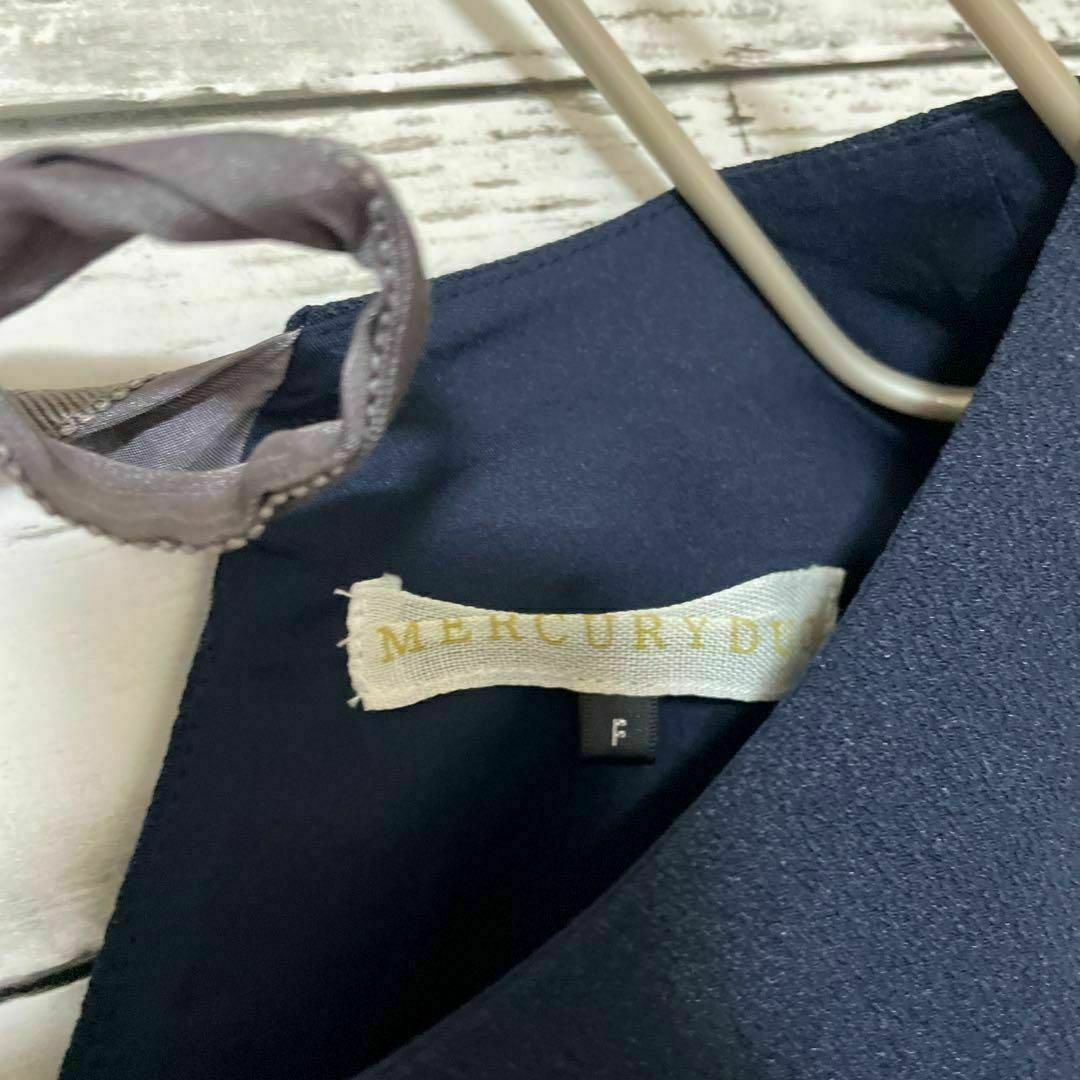 MERCURYDUO(マーキュリーデュオ)のMERCURY DUO バックリボンブラウス 異素材切替 ネイビー グレー レディースのトップス(シャツ/ブラウス(半袖/袖なし))の商品写真