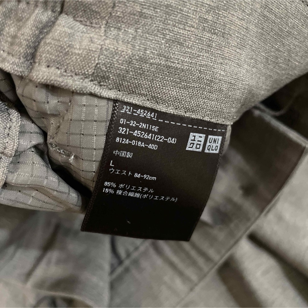 UNIQLO(ユニクロ)のユニクロ タックテーパードパンツ Lメンズ グレー メンズのパンツ(スラックス)の商品写真