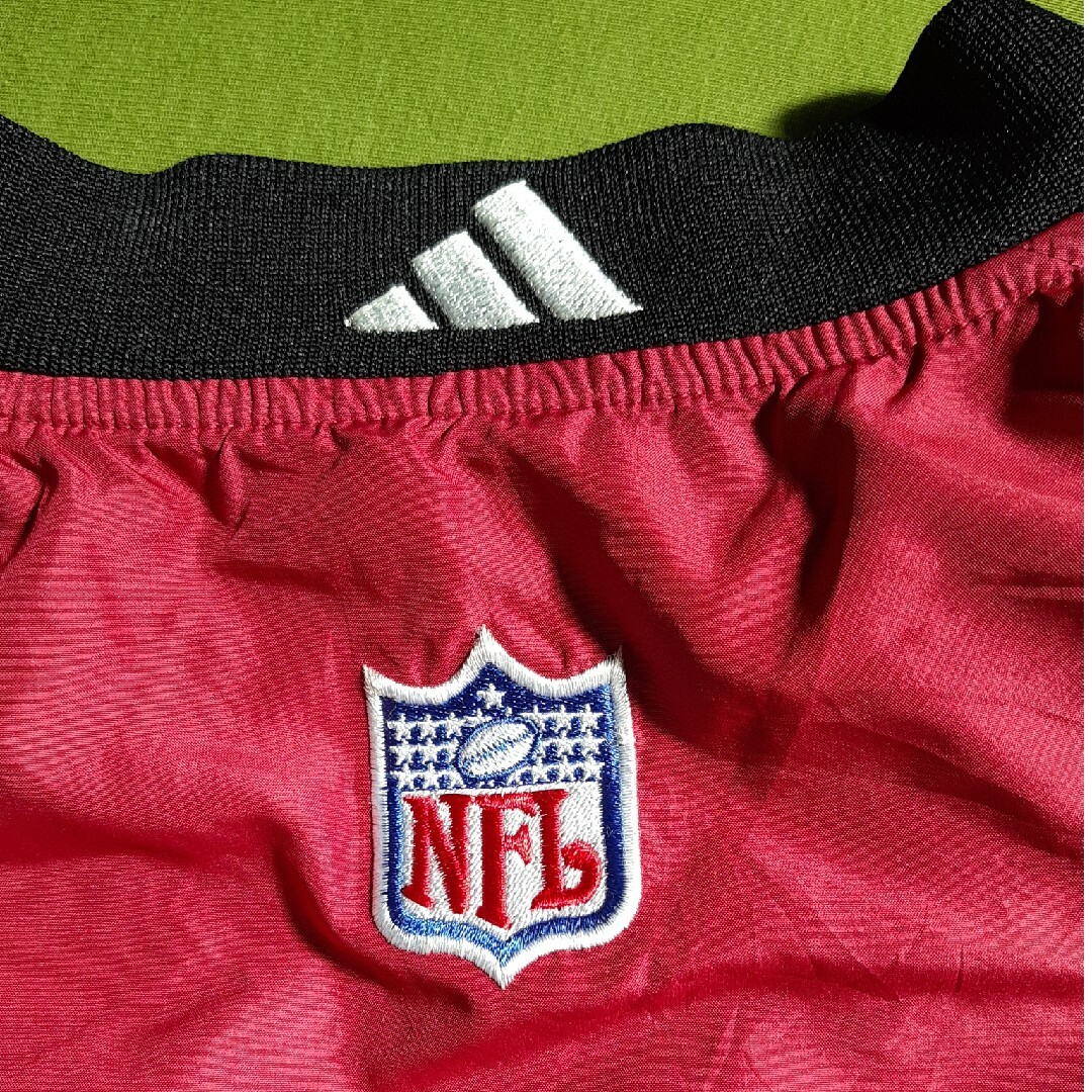 adidas(アディダス)のNFL 49ERS ナイロンプルオーバー スポーツ/アウトドアのスポーツ/アウトドア その他(アメリカンフットボール)の商品写真