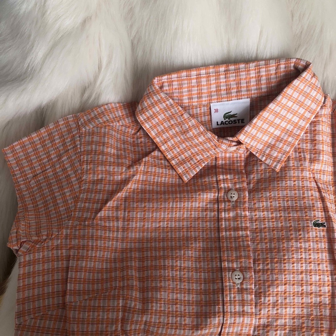 Lochie(ロキエ)のLACOSTE orange shirt レディースのトップス(シャツ/ブラウス(半袖/袖なし))の商品写真