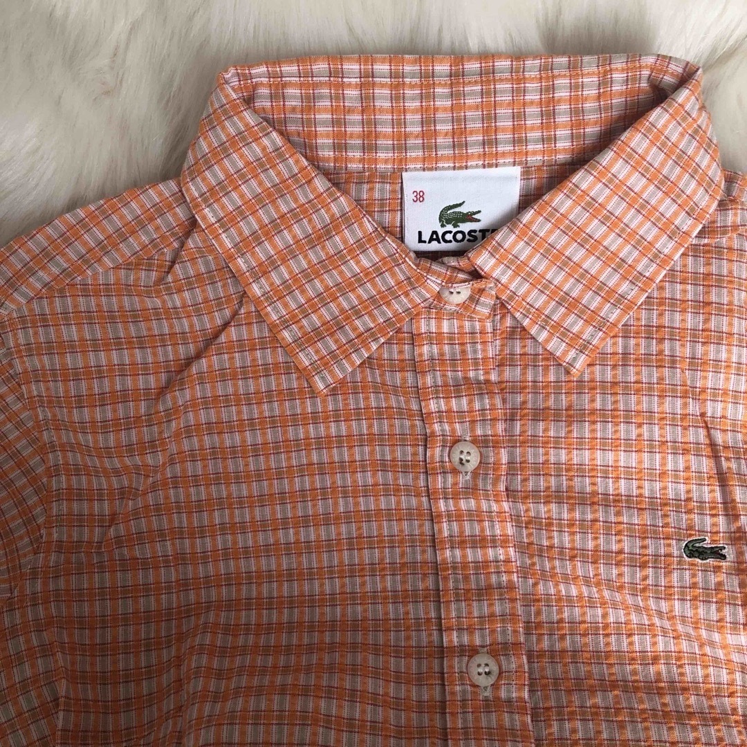 Lochie(ロキエ)のLACOSTE orange shirt レディースのトップス(シャツ/ブラウス(半袖/袖なし))の商品写真