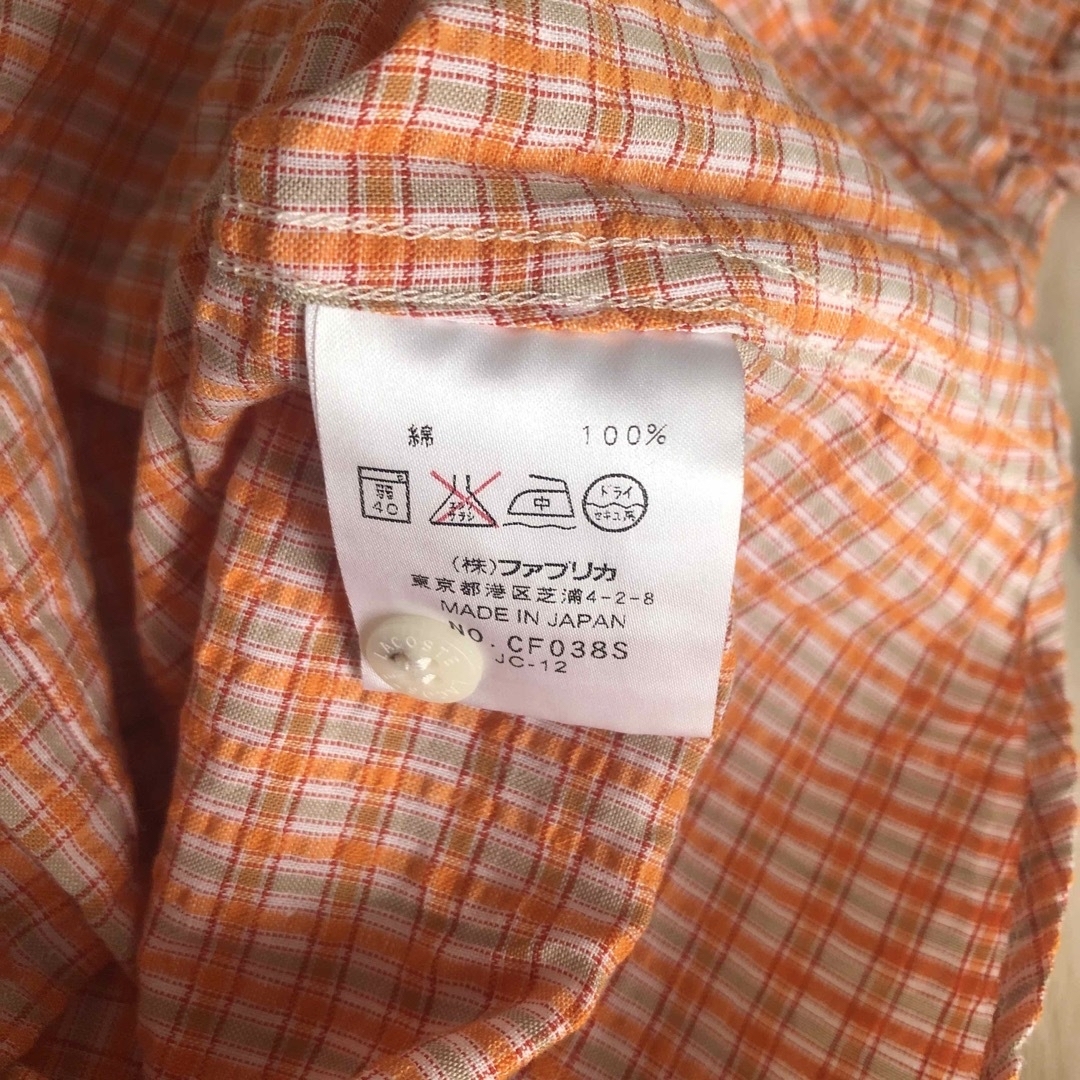 Lochie(ロキエ)のLACOSTE orange shirt レディースのトップス(シャツ/ブラウス(半袖/袖なし))の商品写真
