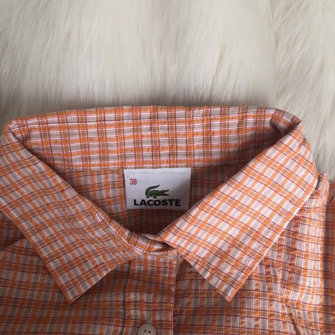 Lochie(ロキエ)のLACOSTE orange shirt レディースのトップス(シャツ/ブラウス(半袖/袖なし))の商品写真