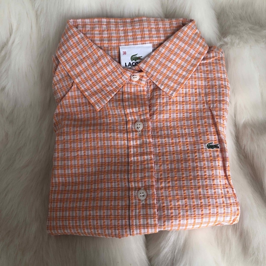 Lochie(ロキエ)のLACOSTE orange shirt レディースのトップス(シャツ/ブラウス(半袖/袖なし))の商品写真