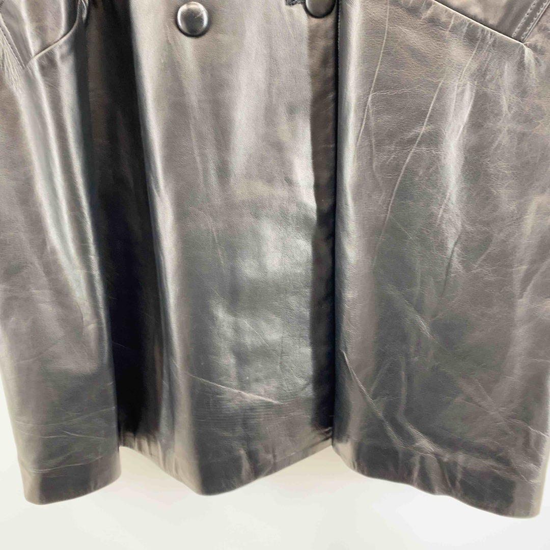 M・O・N　　KURONO　牛革100％　裏地ペーズリー柄　日本製　黒　肩パットあり　  レディース レザーサイズL レディースのジャケット/アウター(ロングコート)の商品写真