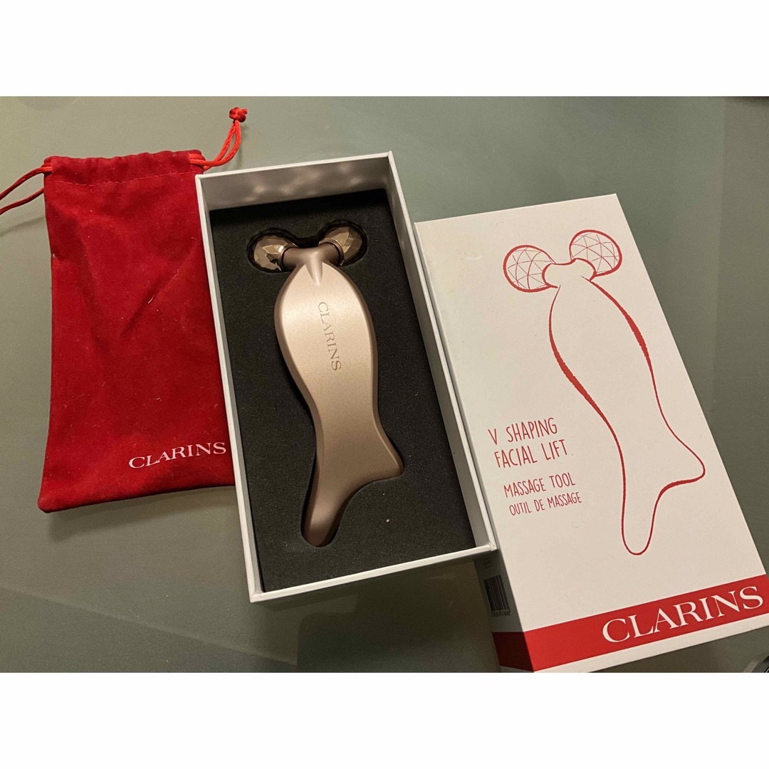 CLARINS(クラランス)のクラランス　マッサージツール　Vコントアセラム美顔器　非売品 コスメ/美容のスキンケア/基礎化粧品(フェイスローラー/小物)の商品写真