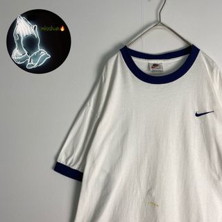 ナイキ(NIKE)の【NIKE　リンガーＴシャツ　USA製　ワンポイントロゴ　白　ネイビー　古着】(Tシャツ/カットソー(半袖/袖なし))