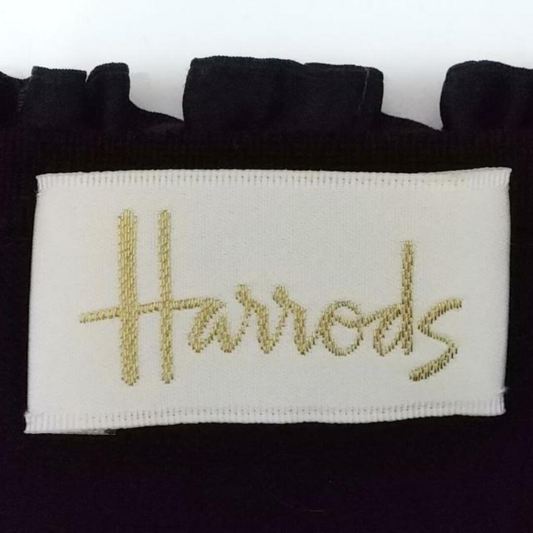 Harrods(ハロッズ)のHARRODS(ハロッズ) カーディガン レディース美品  - 黒 長袖/フリル レディースのトップス(カーディガン)の商品写真