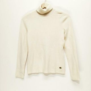 フォクシー(FOXEY)のFOXEY(フォクシー) 長袖セーター サイズ42 L レディース - アイボリー タートルネック(ニット/セーター)