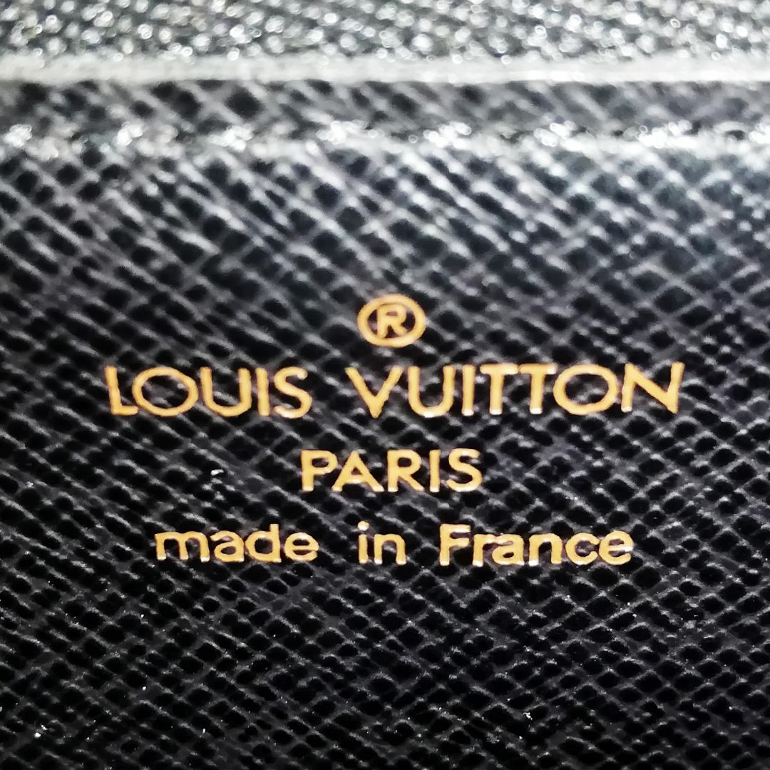 LOUIS VUITTON(ルイヴィトン)の【美品級/リペア】ルイ・ヴィトン（エピ）セリエ　ドラゴンヌ　ブラック レディースのバッグ(クラッチバッグ)の商品写真