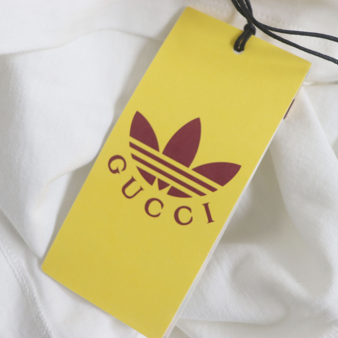 Gucci(グッチ)の未使用品 GUCCI グッチ adidas 22SS 548334 コットン トレフォイル ロゴプリント 半袖Ｔシャツ ホワイト S イタリア製 正規品 メンズ メンズのトップス(Tシャツ/カットソー(半袖/袖なし))の商品写真