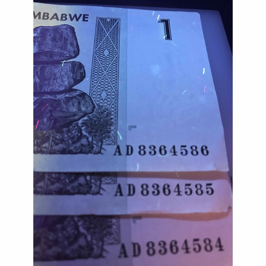 未使用級 2007年 希少レア Zimbabwe 紙幣 1ドル 3連番 ZIM エンタメ/ホビーのコレクション(印刷物)の商品写真