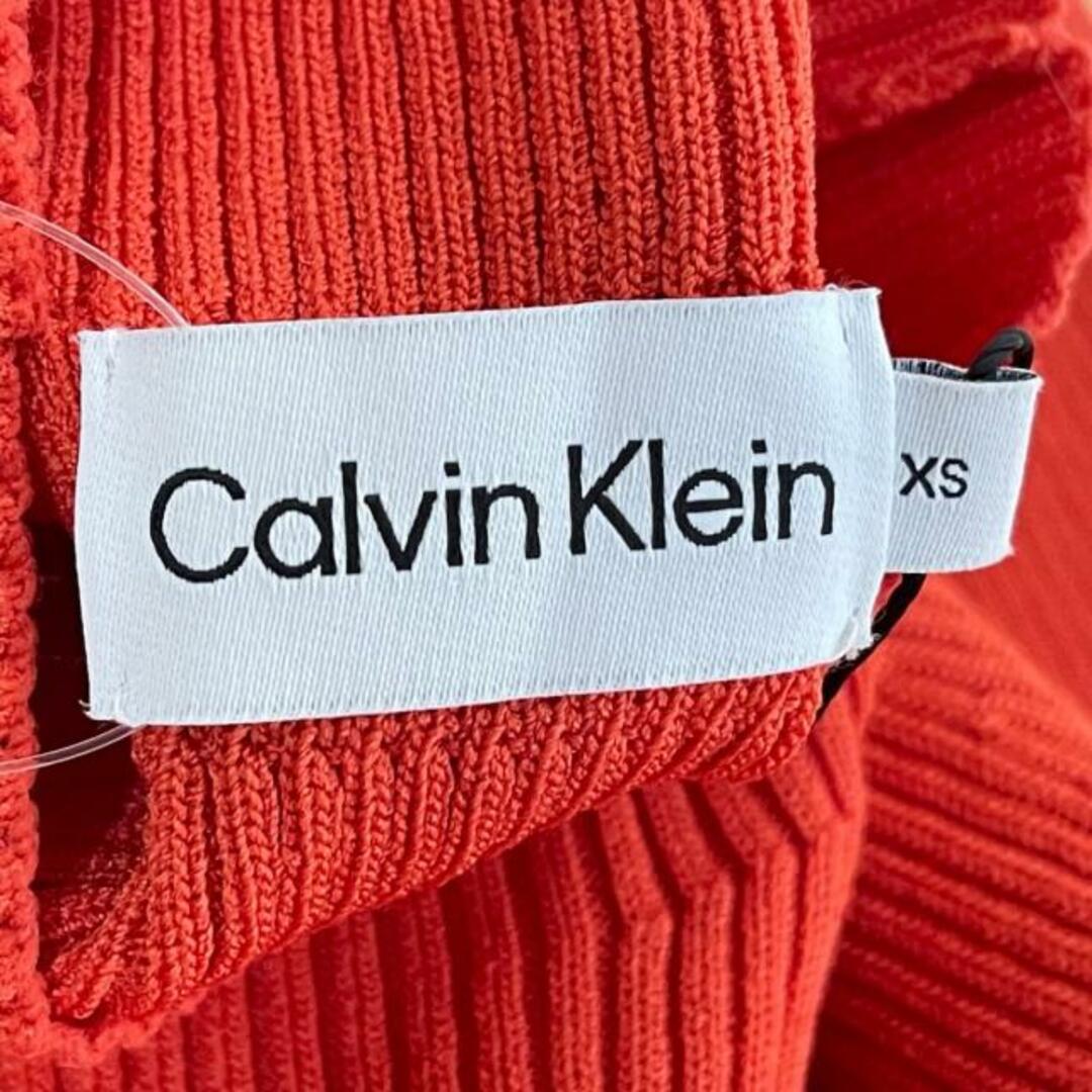 Calvin Klein(カルバンクライン)のCalvinKlein(カルバンクライン) ワンピース サイズXS レディース美品  - オレンジ ハイネック/長袖/ひざ丈/ニット レディースのワンピース(その他)の商品写真