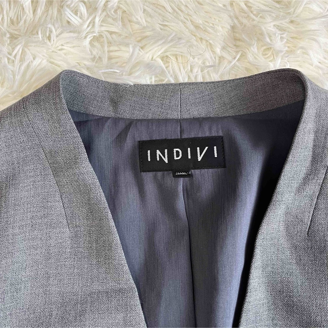 INDIVI(インディヴィ)のINDIVI ノーカラージャケット　グレー　長袖　大きいサイズ　42 レディースのジャケット/アウター(ノーカラージャケット)の商品写真