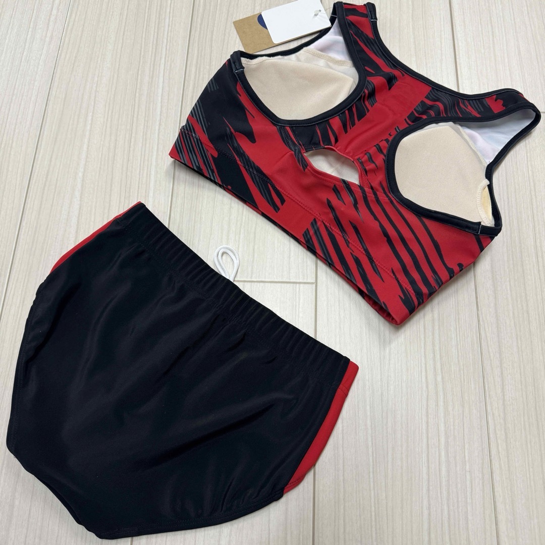 asics(アシックス)のアシックス　女子陸上ユニフォーム上下セット　Lサイズ　ブラック×レッド　新品 スポーツ/アウトドアのスポーツ/アウトドア その他(陸上競技)の商品写真