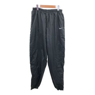 ナイキ(NIKE)のNIKE ナイキ スウォッシュロゴ ナイロン パンツ ボトムス カジュアル スポーツ ブラック (レディース L) 中古 古着 P9886(その他)