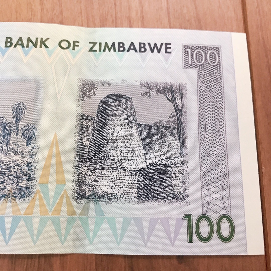 完全未使用級 2007年 Zimbabwe 紙幣 100ドル ZIM エンタメ/ホビーのコレクション(印刷物)の商品写真