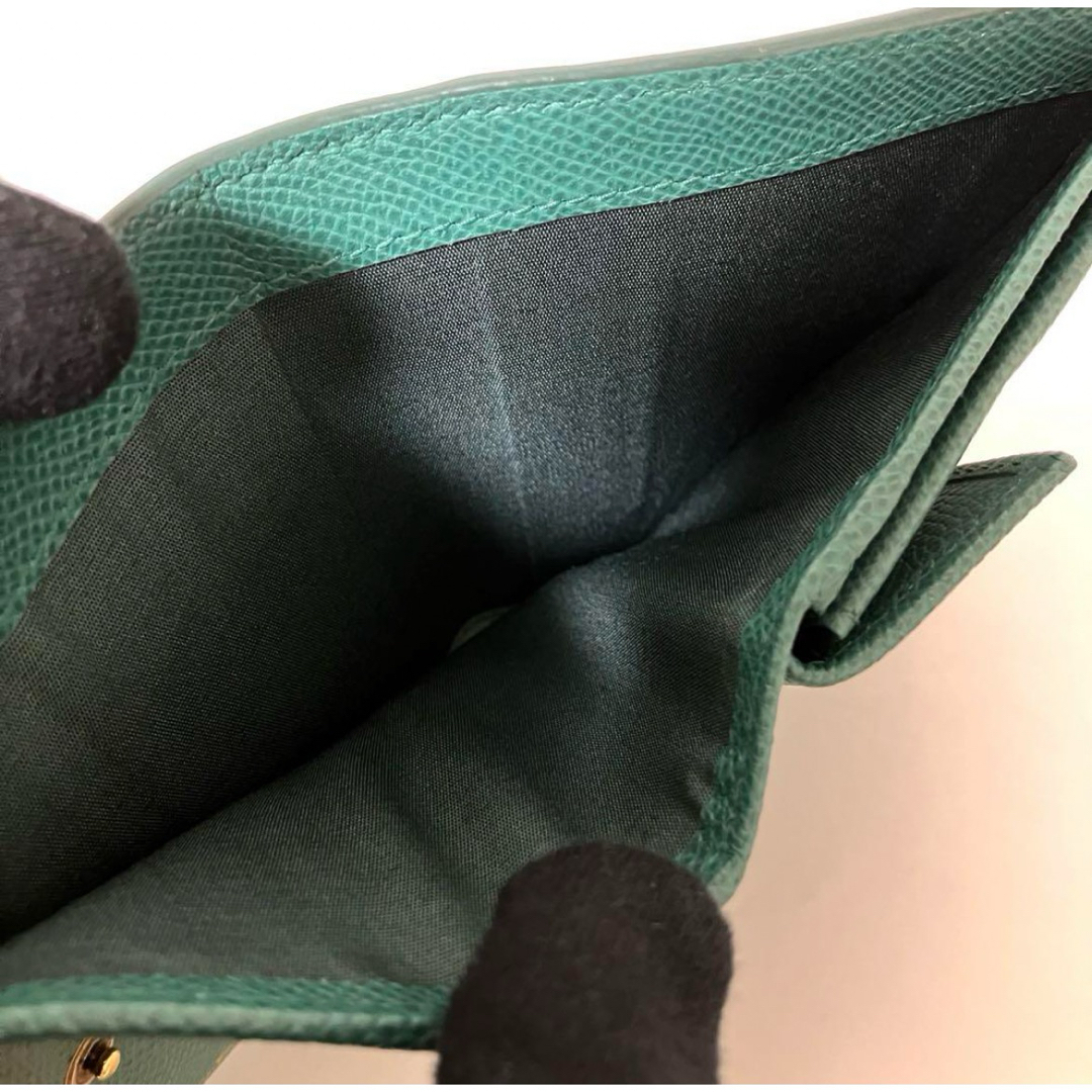 Salvatore Ferragamo(サルヴァトーレフェラガモ)のフェラガモ ガンチーニ 二つ折 財布 コンパクトウォレット 緑  レディースのファッション小物(財布)の商品写真