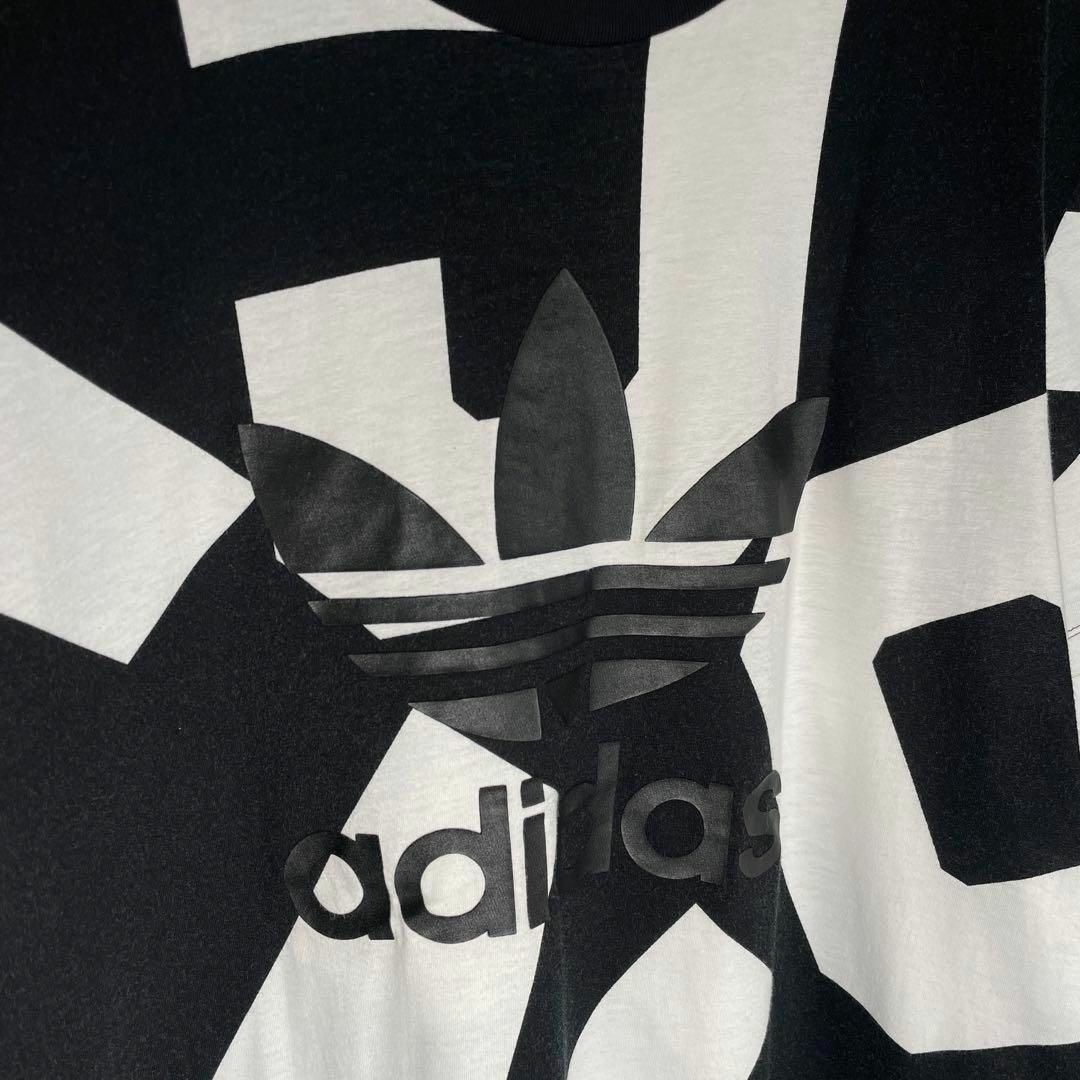 adidas(アディダス)の[古着]アディダス　半袖　Tシャツ　トレフォイルロゴ　プリント　モノクロ　黒　白 その他のその他(その他)の商品写真