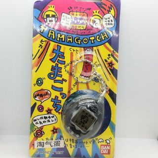 バンダイ(BANDAI)のたまごっち / 中古 / パケ破損あり / 海外版 / 説明書付き(携帯用ゲーム機本体)