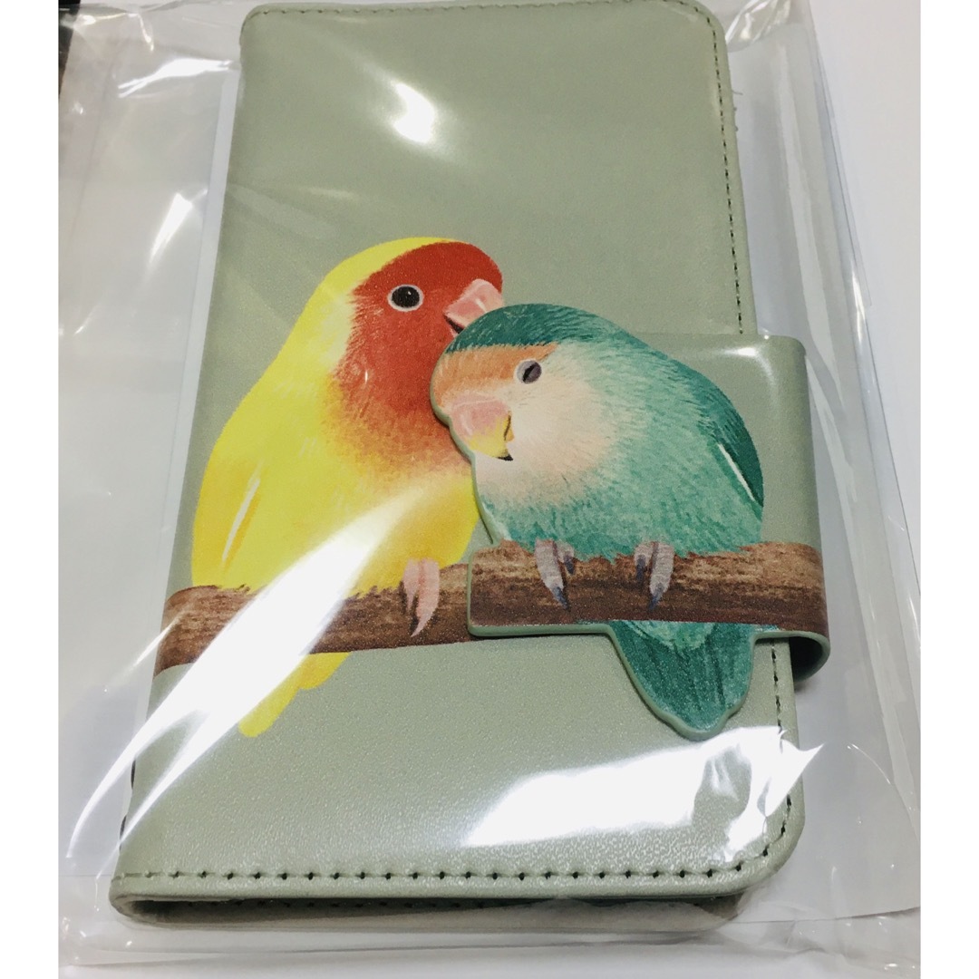 FELISSIMO(フェリシモ)の寄り添うコザクラインコのマルチスマホカバー　サイズ1 新品　フェリシモ スマホ/家電/カメラのスマホアクセサリー(iPhoneケース)の商品写真