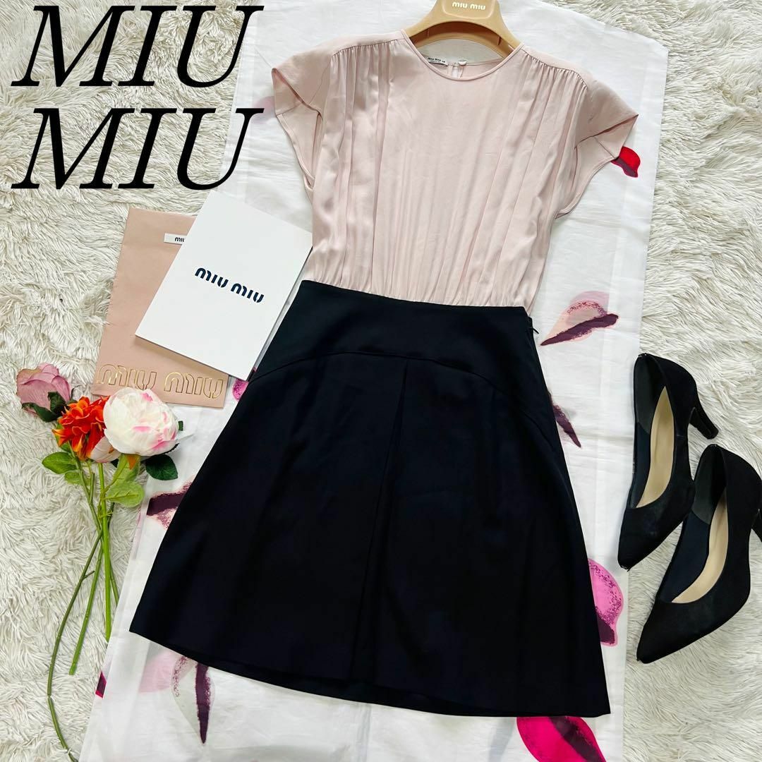 美品】MIU MIU バイカラーワンピース 膝丈 半袖 38 ピンク ブラック 美品】MIU MIU バイカラーワンピース 膝丈 半袖 38 ピンク ブラック