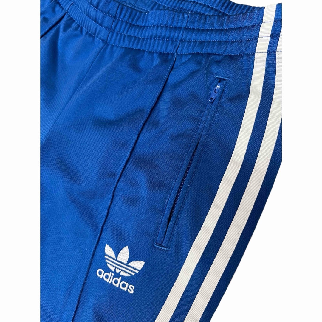 Originals（adidas）(オリジナルス)のadidas originals トラックパンツ 青色 Sサイズ レディース レディースのパンツ(その他)の商品写真