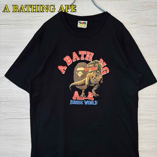 アベイシングエイプ(A BATHING APE)の【入手困難】アベイシングエイプ × ジュラシックワールド Tシャツ　XLサイズ(Tシャツ/カットソー(半袖/袖なし))