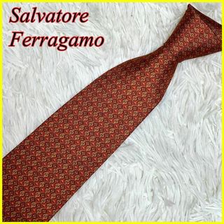 サルヴァトーレフェラガモ(Salvatore Ferragamo)の【未使用タグ付き】サルヴァトーレフェラガモ ネクタイ 赤茶 緋色 総柄 シルク(ネクタイ)