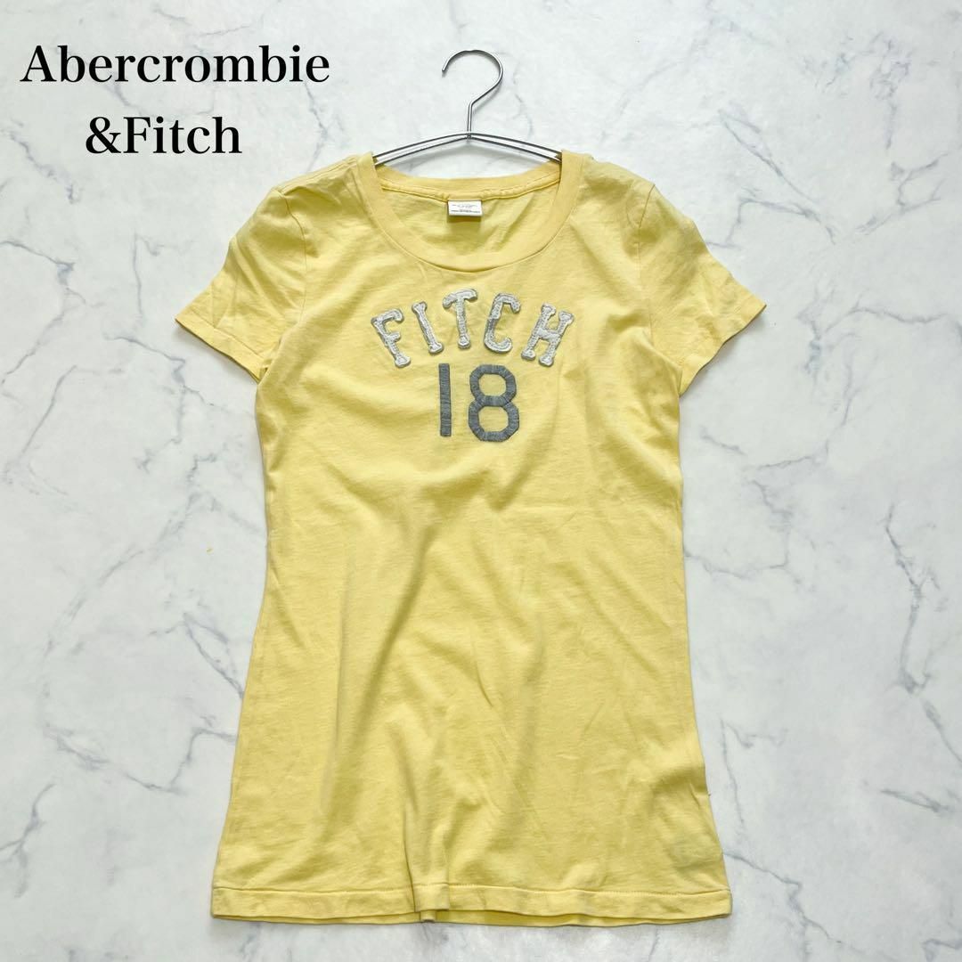 Abercrombie&Fitch(アバクロンビーアンドフィッチ)のAbercrombre&Fitch アバクロ　ロゴ　半袖Tシャツ　イエロー　綿 レディースのトップス(Tシャツ(半袖/袖なし))の商品写真