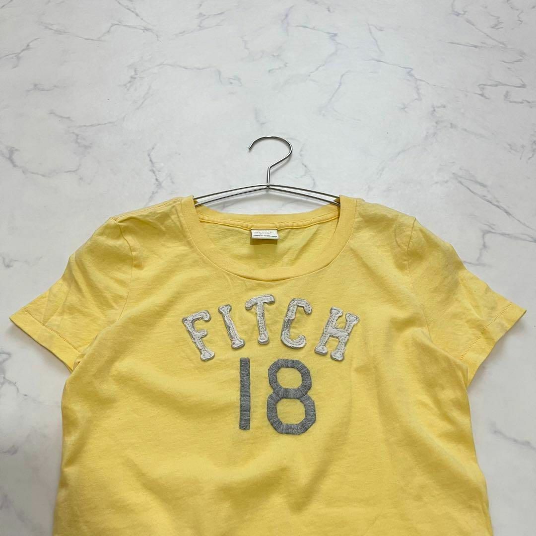 Abercrombie&Fitch(アバクロンビーアンドフィッチ)のAbercrombre&Fitch アバクロ　ロゴ　半袖Tシャツ　イエロー　綿 レディースのトップス(Tシャツ(半袖/袖なし))の商品写真