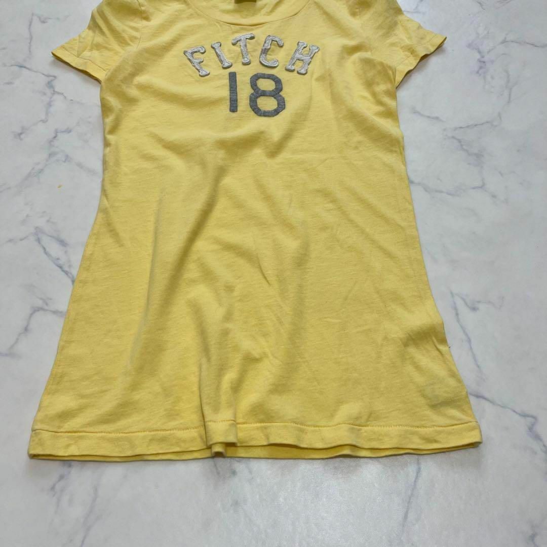 Abercrombie&Fitch(アバクロンビーアンドフィッチ)のAbercrombre&Fitch アバクロ　ロゴ　半袖Tシャツ　イエロー　綿 レディースのトップス(Tシャツ(半袖/袖なし))の商品写真
