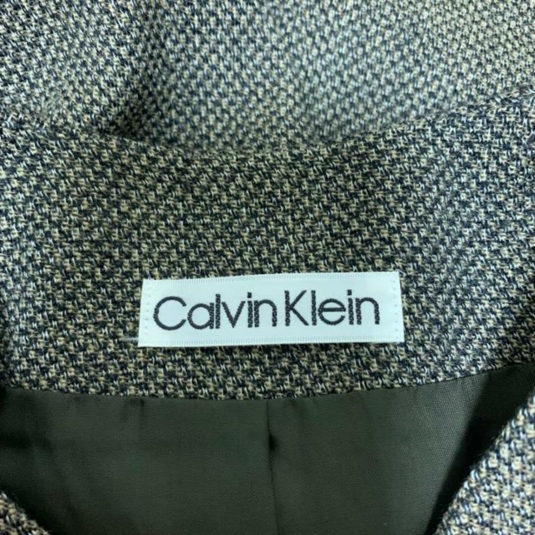 Calvin Klein(カルバンクライン)のCalvinKlein(カルバンクライン) コート サイズ11 M レディース美品  - 黒×ダークブラウン×アイボリー 長袖/ツイード/肩パッド/秋/冬 レディースのジャケット/アウター(その他)の商品写真