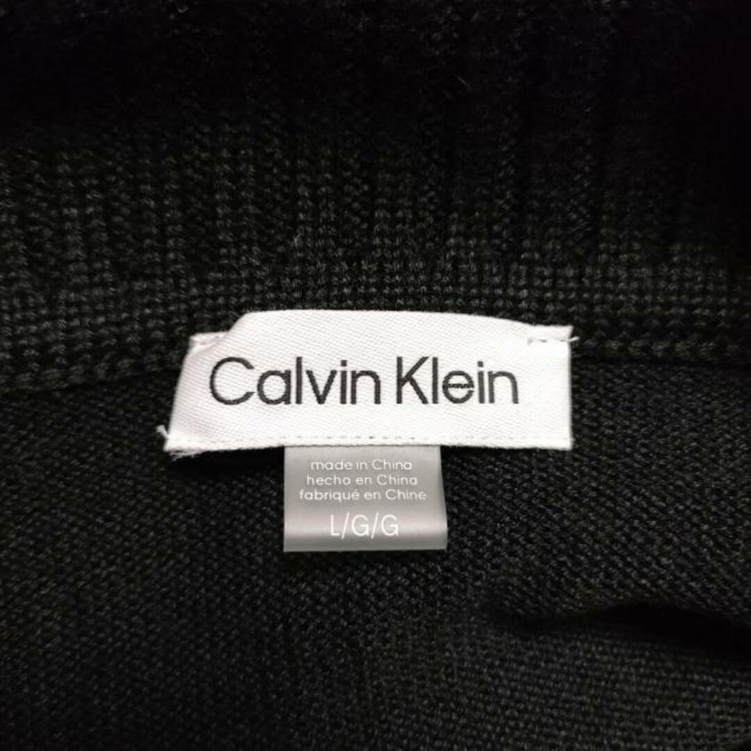 Calvin Klein(カルバンクライン)のCalvinKlein(カルバンクライン) ワンピース サイズL/G/G レディース - 黒 タートルネック/長袖/ひざ丈/ニット/フリンジ レディースのワンピース(その他)の商品写真