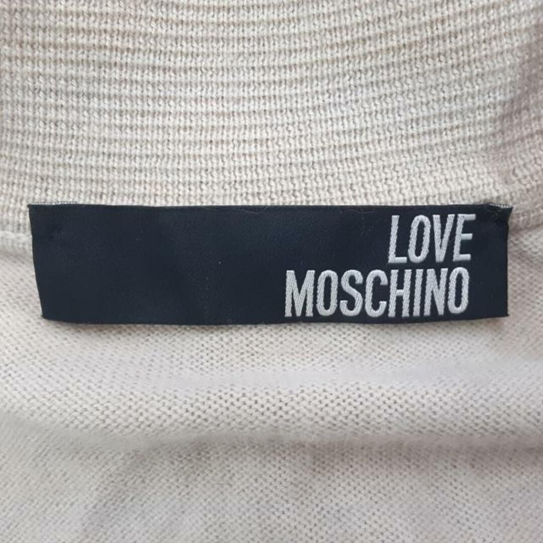 LOVE MOSCHINO(ラブモスキーノ) ブルゾン レディース美品  - ベージュ×ゴールド 長袖/ニット/フリル/春/秋 レディースのジャケット/アウター(ブルゾン)の商品写真