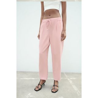 ザラ(ZARA)のザラ  ZARA☆ハイウエスト ストリング入りフレアパンツ  桜色 XS(クロップドパンツ)