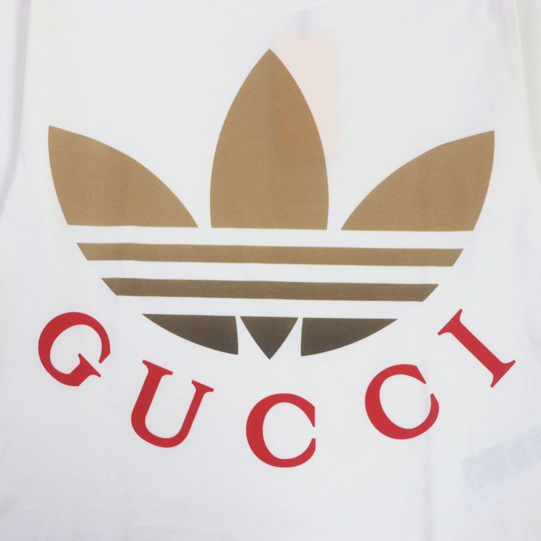 Gucci(グッチ)の未使用品 GUCCI グッチ adidas 23SS 548334 コットン100％ トレフォイル ロゴプリント クルーネック カットソー 半袖Ｔシャツ ホワイト S イタリア製 正規品 メンズ メンズのトップス(Tシャツ/カットソー(半袖/袖なし))の商品写真