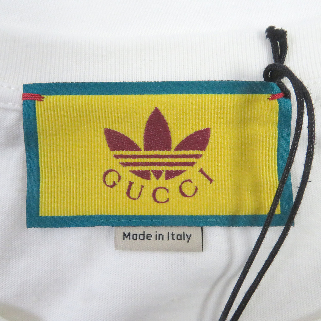 Gucci(グッチ)の未使用品 GUCCI グッチ adidas 23SS 548334 コットン100％ トレフォイル ロゴプリント クルーネック カットソー 半袖Ｔシャツ ホワイト S イタリア製 正規品 メンズ メンズのトップス(Tシャツ/カットソー(半袖/袖なし))の商品写真