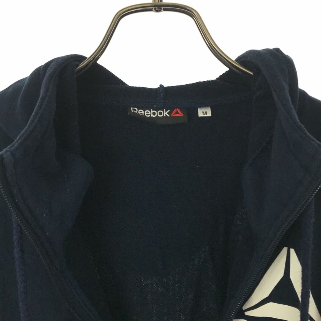 Reebok(リーボック)のリーボック プリント 長袖 ジップパーカー M ネイビー Reebok メンズ 古着 【240315】 メンズのトップス(パーカー)の商品写真