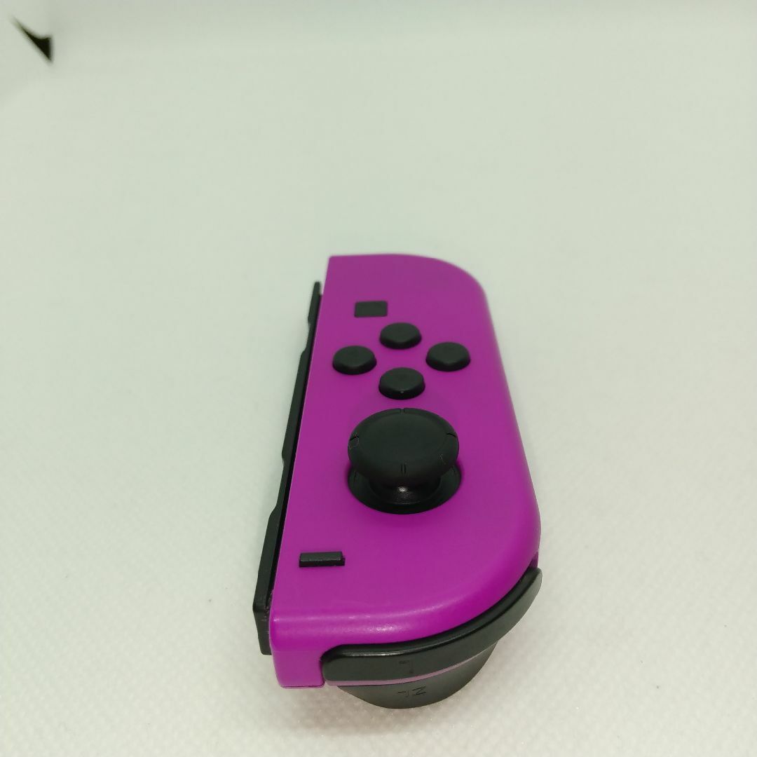 Nintendo Switch(ニンテンドースイッチ)の【希少】⑦Switch ジョイコン　ネオンパープル　左のみ(L)【任天堂純正品】 エンタメ/ホビーのゲームソフト/ゲーム機本体(家庭用ゲーム機本体)の商品写真