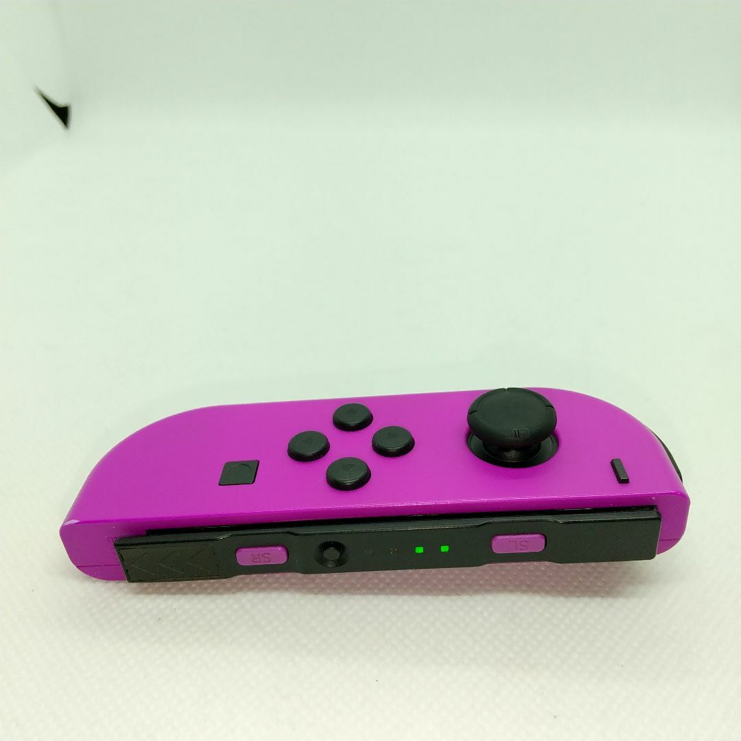 Nintendo Switch(ニンテンドースイッチ)の【希少】⑦Switch ジョイコン　ネオンパープル　左のみ(L)【任天堂純正品】 エンタメ/ホビーのゲームソフト/ゲーム機本体(家庭用ゲーム機本体)の商品写真